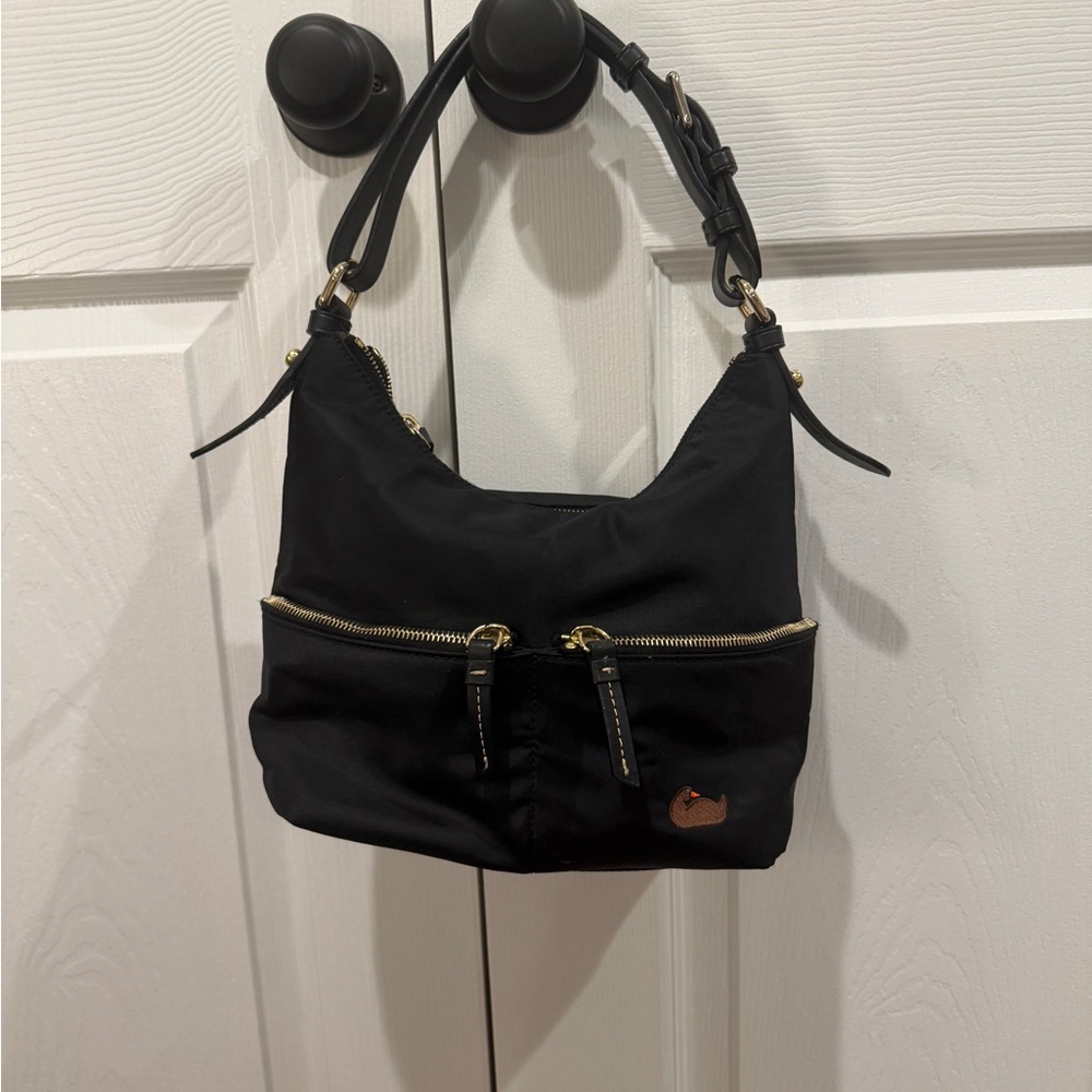 Dooney and Bourke gently used Black nylon shoulder bag pink interior